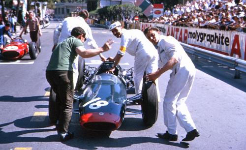 Mike Hailwood's car being pushed to the grid